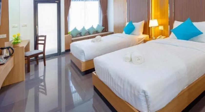Bed in Thanburi Hotel