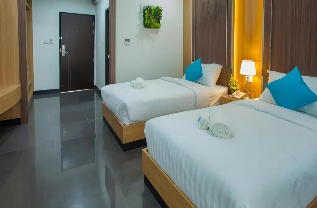 Bed in Thanburi Hotel