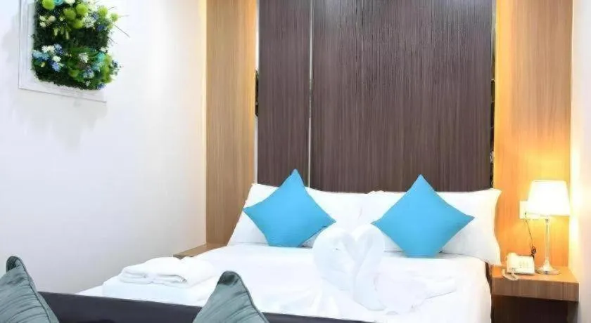 Bed in Thanburi Hotel