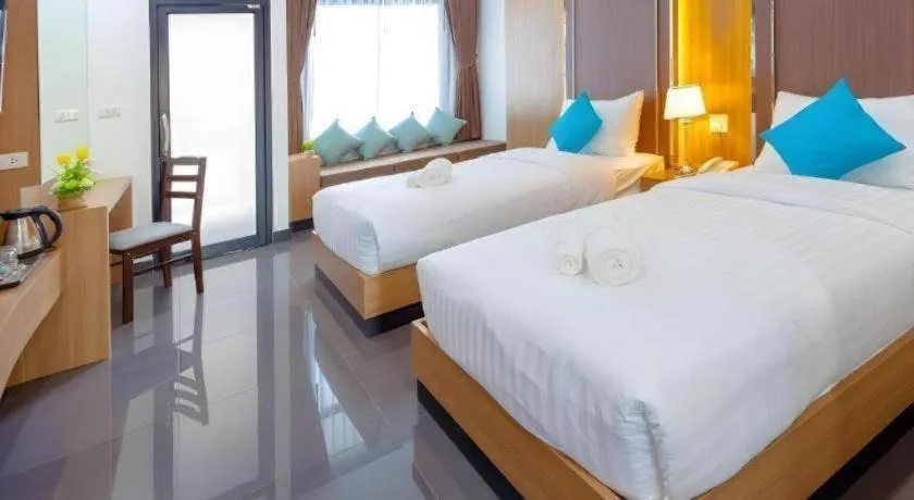 Bed in Thanburi Hotel