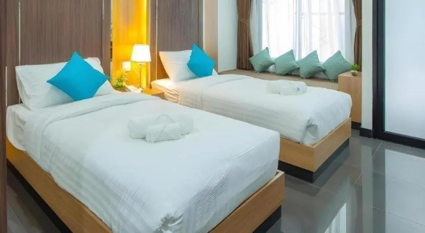 Bed in Thanburi Hotel