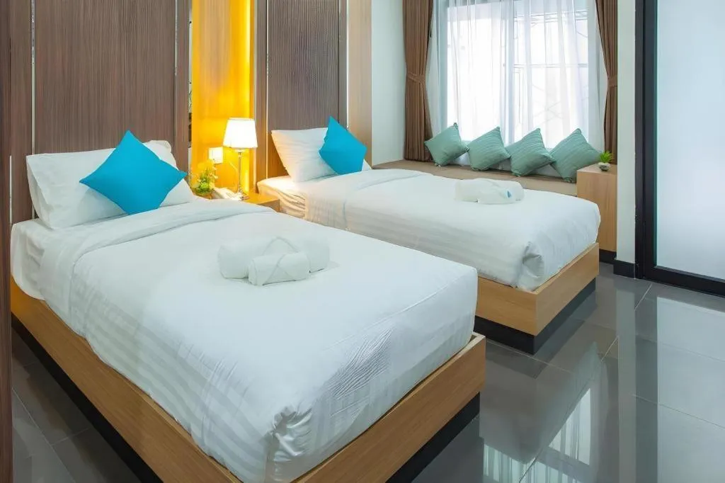 Bed in Thanburi Hotel