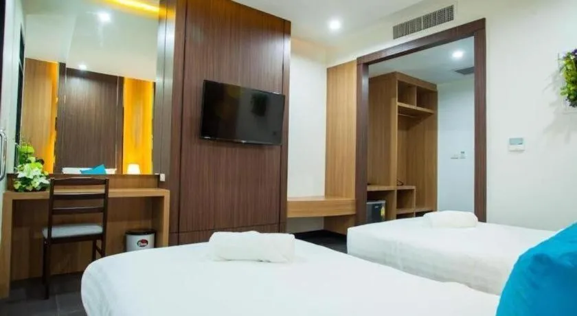 Bed in Thanburi Hotel