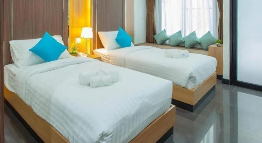 Bed in Thanburi Hotel