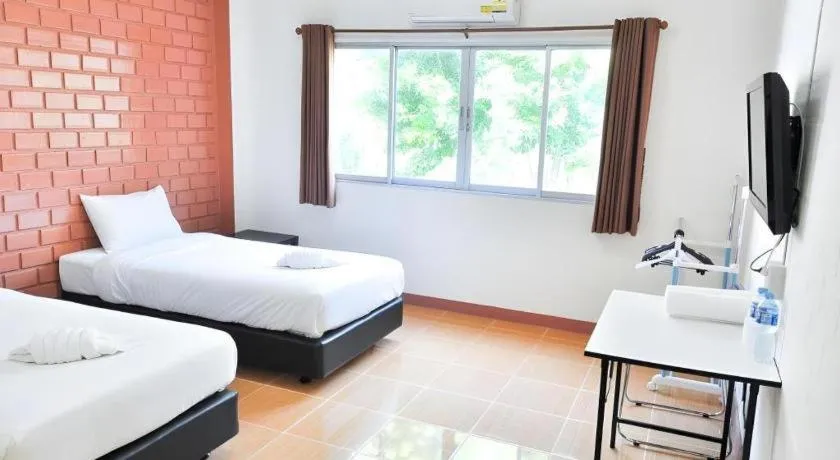 Bed in Bussarakam Place Hotel