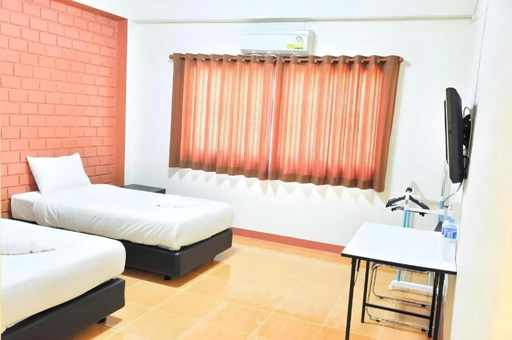 Bed in Bussarakam Place Hotel