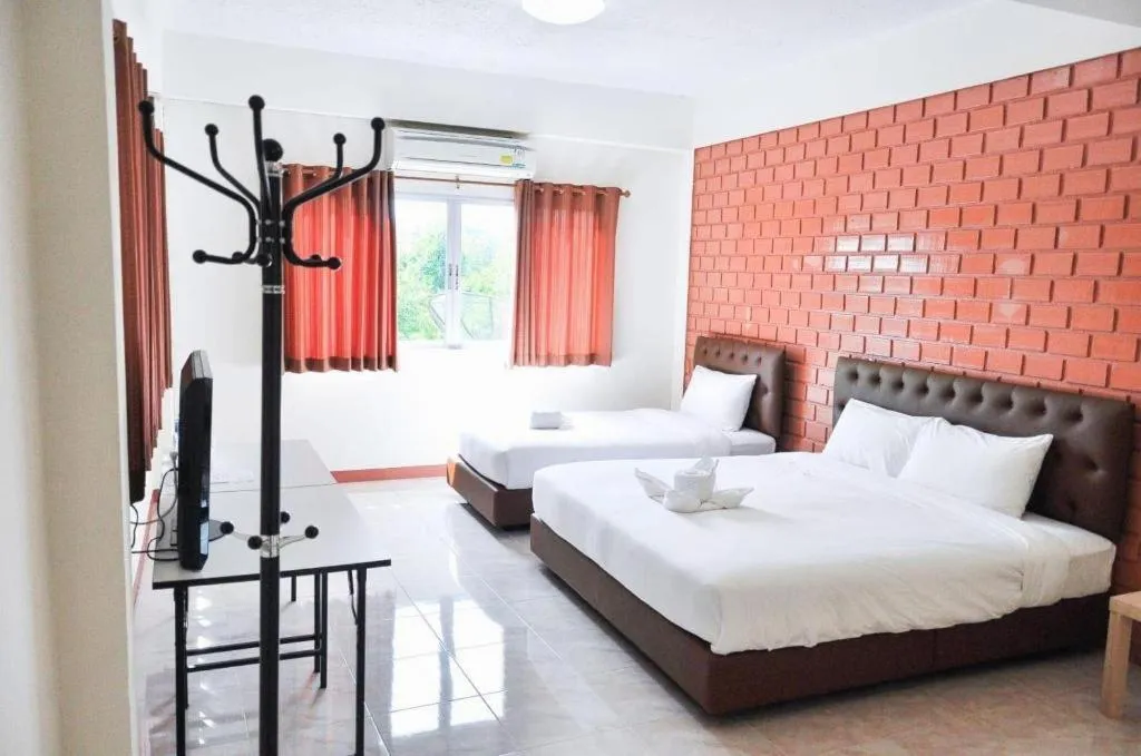 Bed in Bussarakam Place Hotel