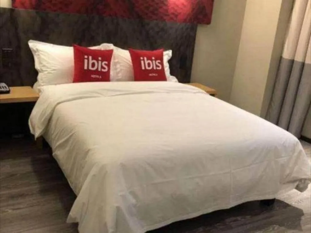 Bed in ibis Wuxi Jiangnan University