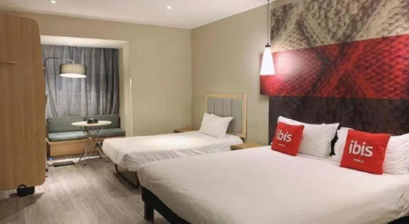 Bed in ibis Wuxi Jiangnan University