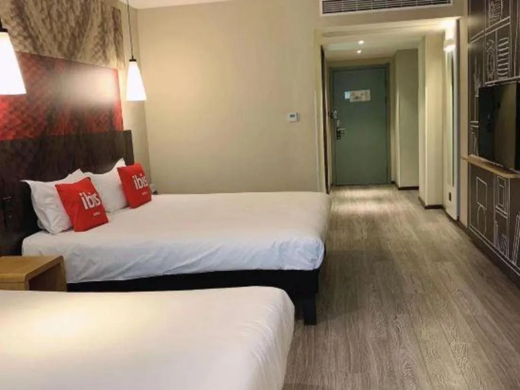 Bed in ibis Wuxi Jiangnan University