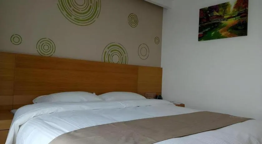 Bed in GreenTree Inn Anqing Qianshan County Sunshine City Express Hotel