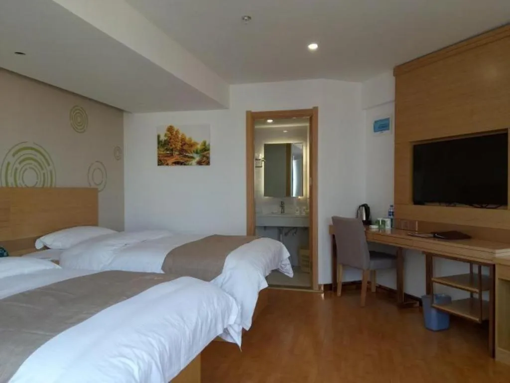Bed in GreenTree Inn Anqing Qianshan County Sunshine City Express Hotel