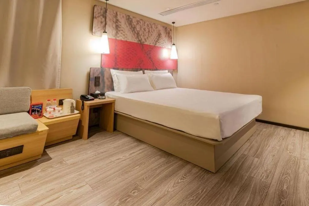 Bed in Ibis Harbin Normal University