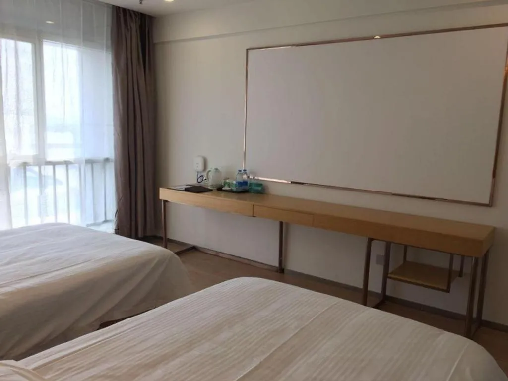 Bed in GreenTree Inn Yancheng Jiefang Road Express Hotel