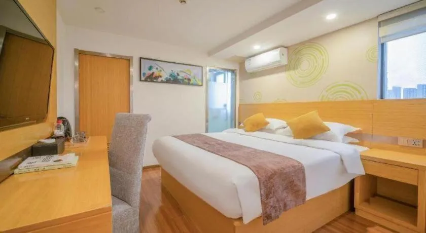 Bed in GreenTree Inn Yancheng Jiefang Road Express Hotel