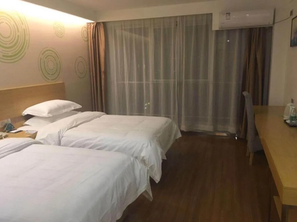 Bed in GreenTree Inn Yancheng Jiefang Road Express Hotel
