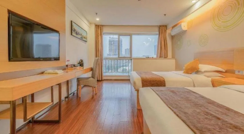 Bed in GreenTree Inn Yancheng Jiefang Road Express Hotel