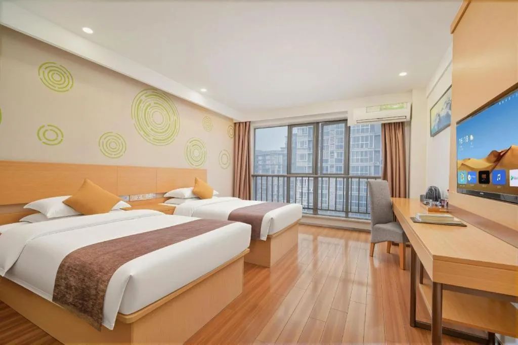 Bed in GreenTree Inn Yancheng Jiefang Road Express Hotel