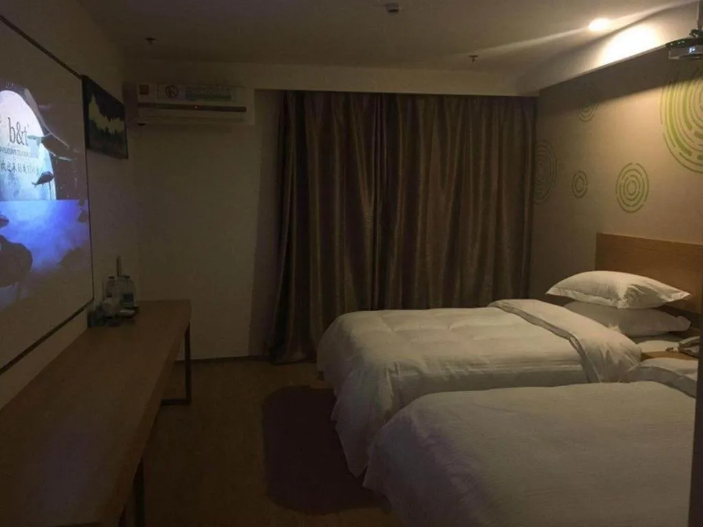 Bed in GreenTree Inn Yancheng Jiefang Road Express Hotel