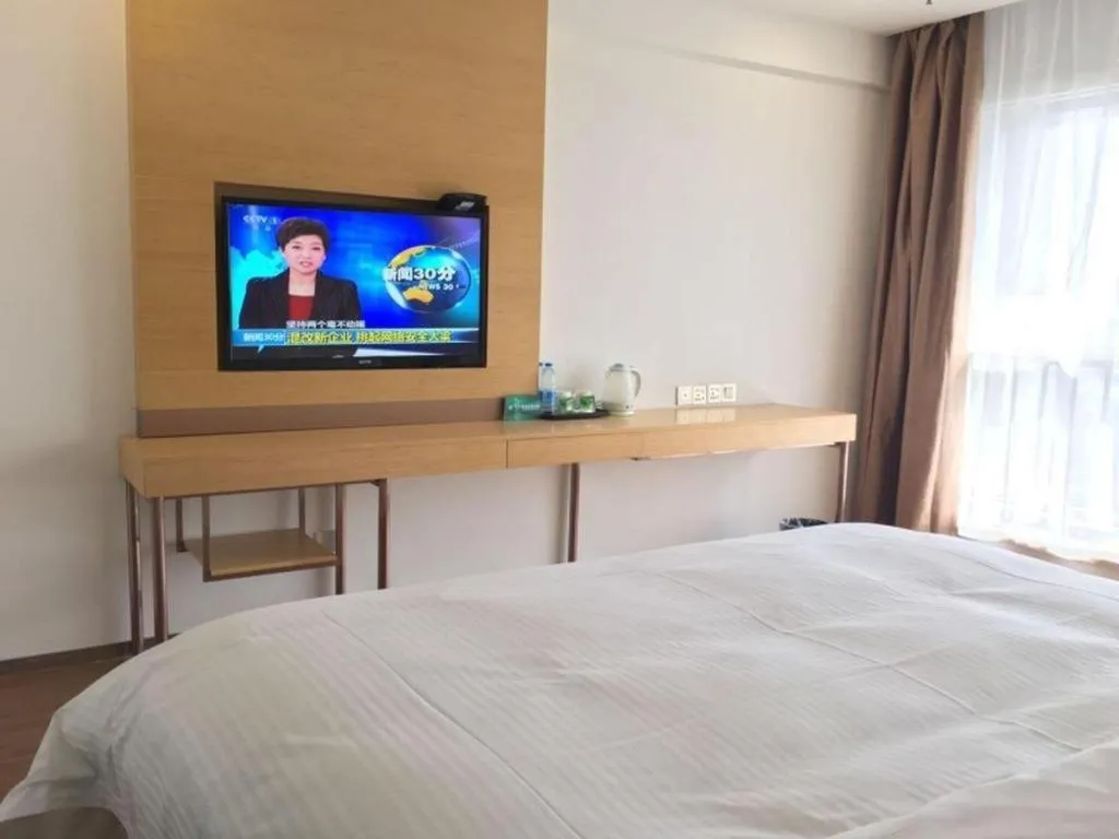 Bed in GreenTree Inn Yancheng Jiefang Road Express Hotel