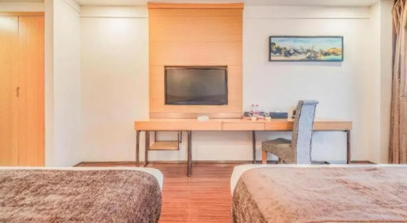 Bed in GreenTree Inn Yancheng Jiefang Road Express Hotel