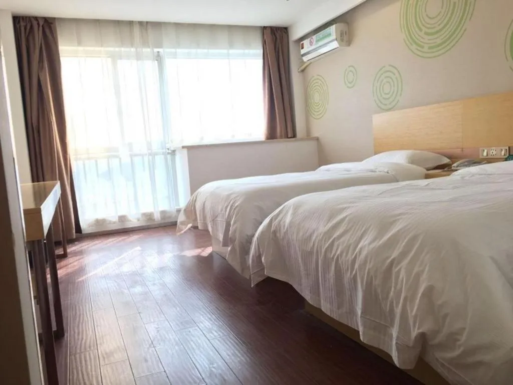 Bed in GreenTree Inn Yancheng Jiefang Road Express Hotel