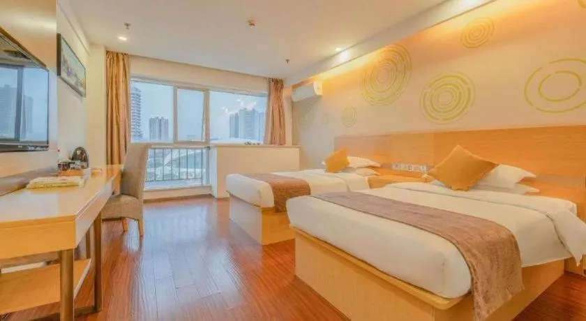 Bed in GreenTree Inn Yancheng Jiefang Road Express Hotel