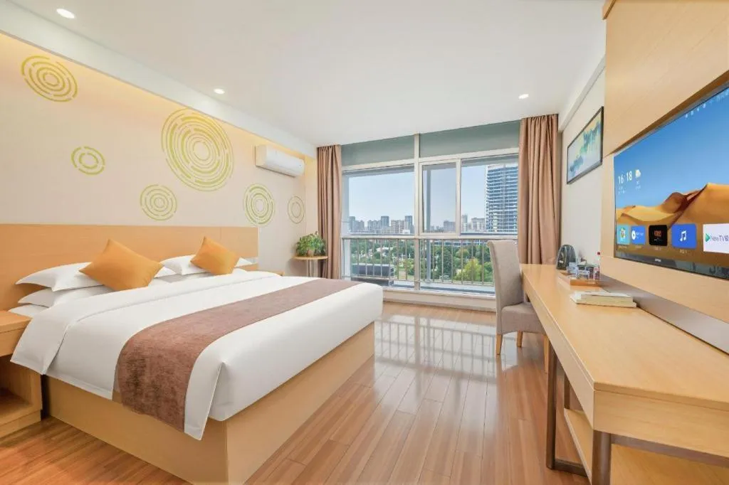 Bed in GreenTree Inn Yancheng Jiefang Road Express Hotel