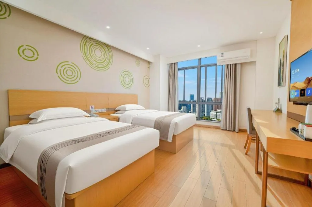 Bed in GreenTree Inn Yancheng Jiefang Road Express Hotel