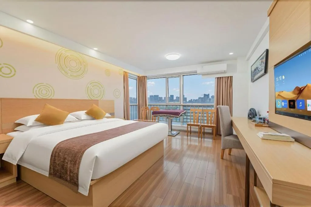 Bed in GreenTree Inn Yancheng Jiefang Road Express Hotel