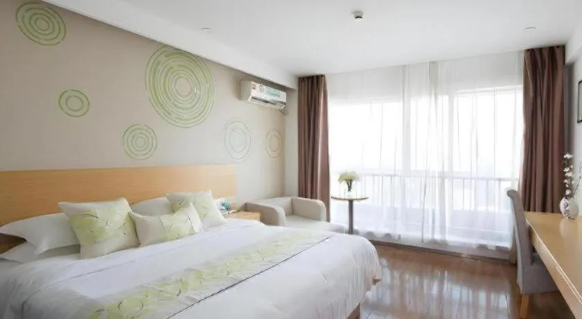 Bed in GreenTree Inn Yancheng Jiefang Road Express Hotel