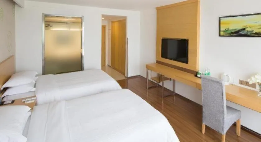 Bed in GreenTree Inn Yancheng Jiefang Road Express Hotel