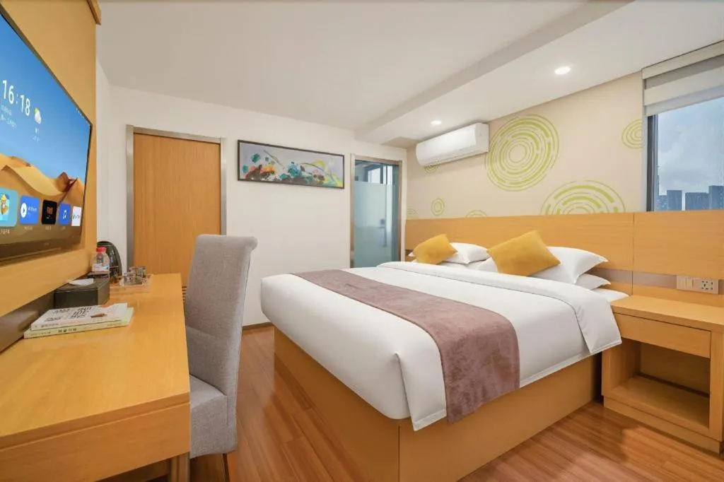 Bed in GreenTree Inn Yancheng Jiefang Road Express Hotel