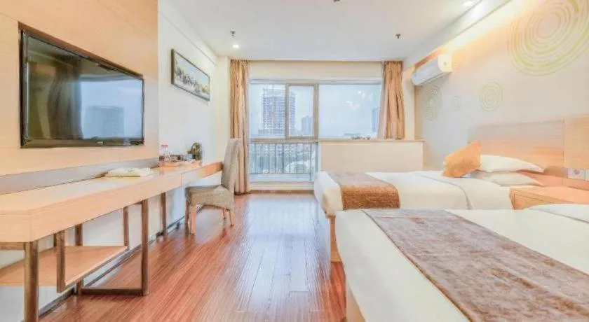 Bed in GreenTree Inn Yancheng Jiefang Road Express Hotel