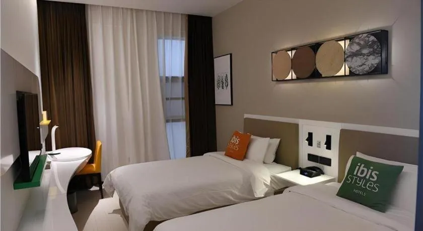 Bed in ibis Styles Kunming Nanping Hotel