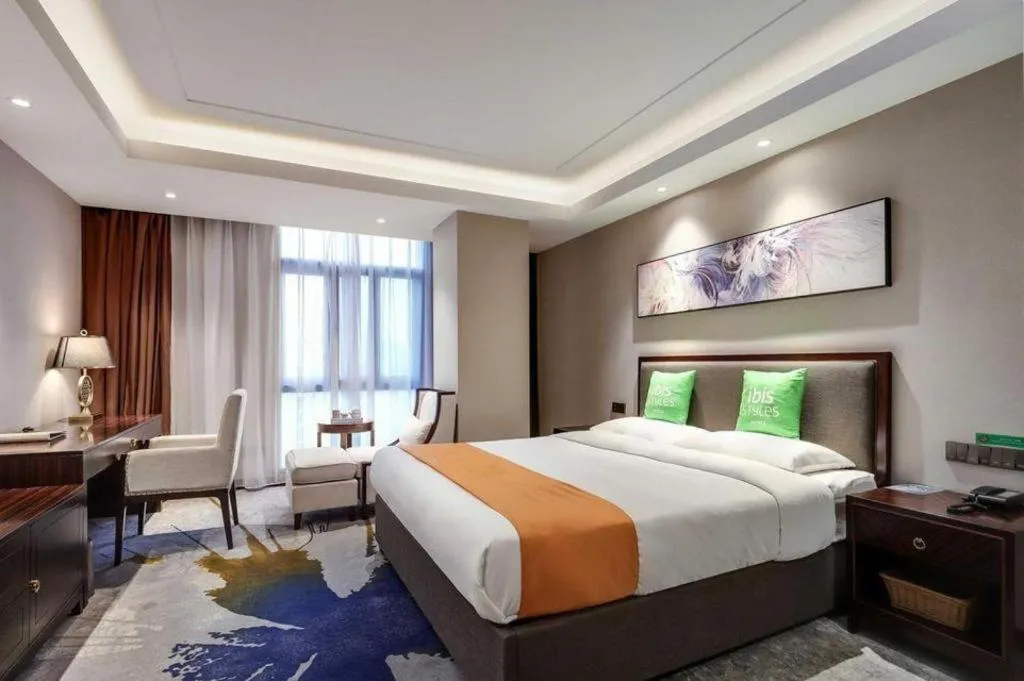 Bed in ibis Styles Nanjing Qilin Gate Hotel