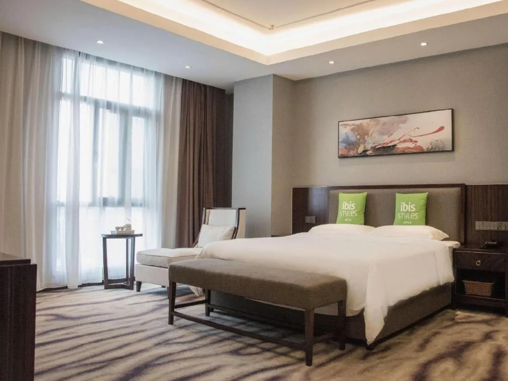 Bed in ibis Styles Nanjing Qilin Gate Hotel