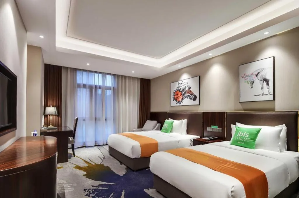 Bed in ibis Styles Nanjing Qilin Gate Hotel