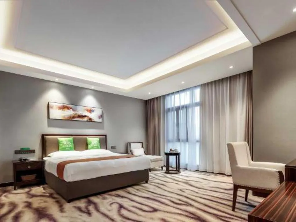 Bed in ibis Styles Nanjing Qilin Gate Hotel