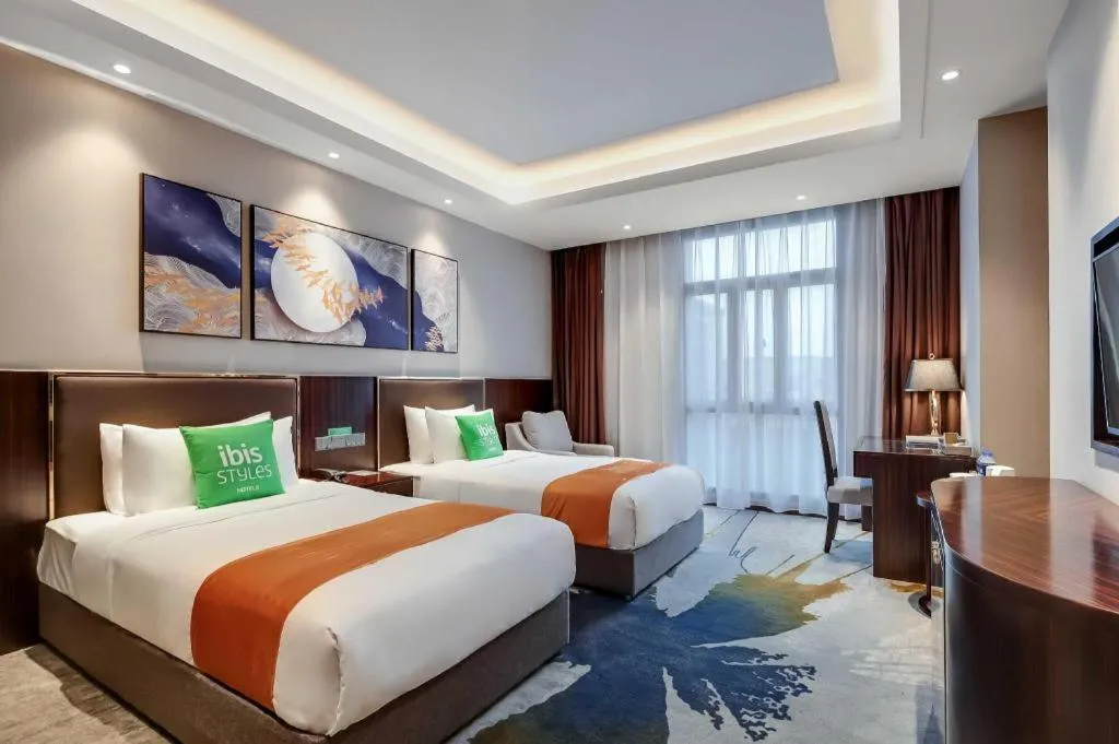 Bed in ibis Styles Nanjing Qilin Gate Hotel