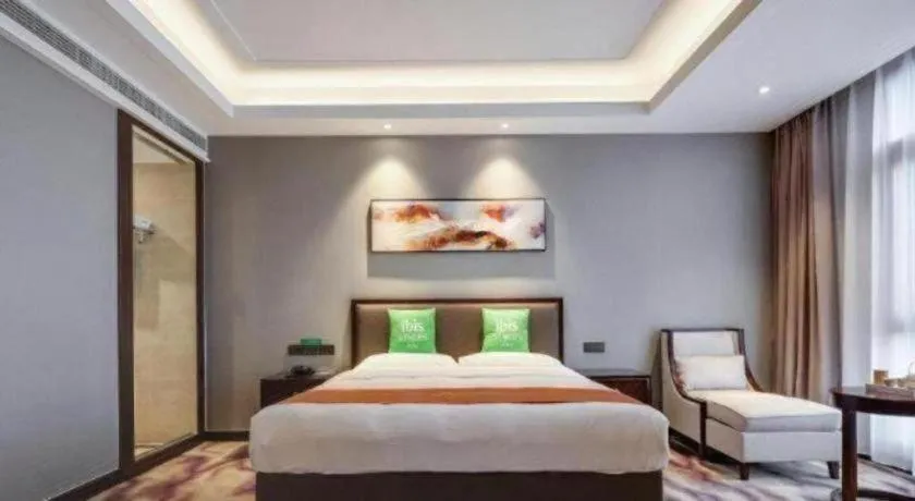 Bed in ibis Styles Nanjing Qilin Gate Hotel