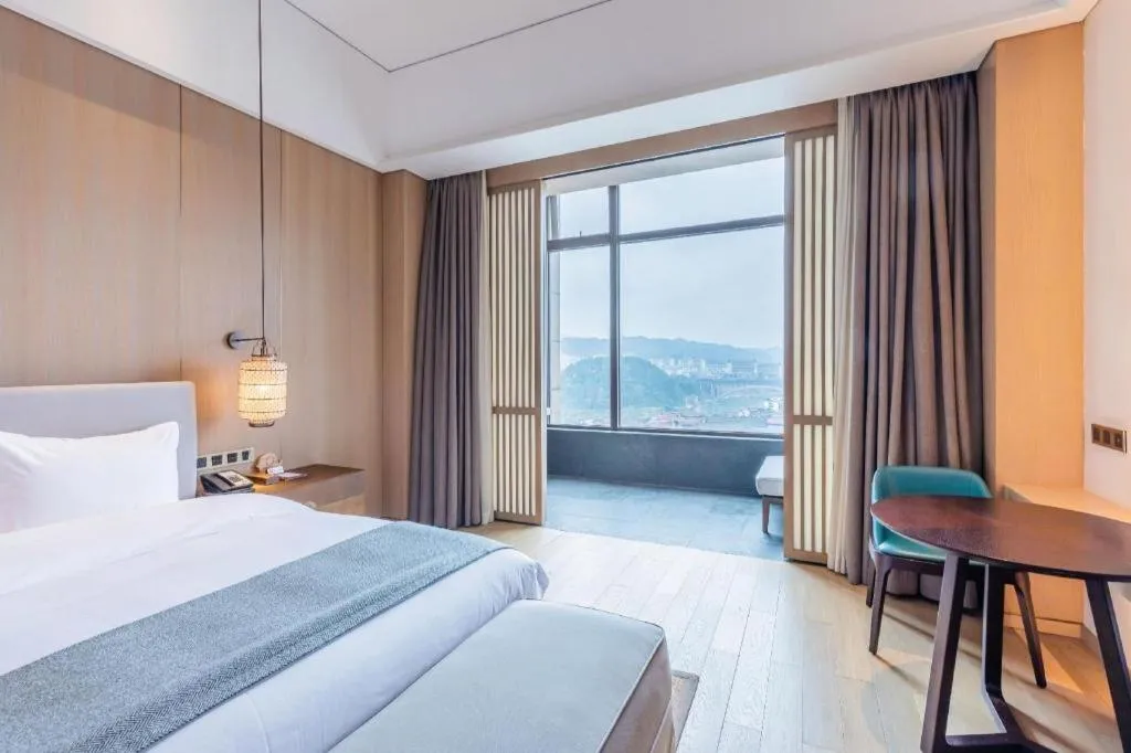 Bed in Jolie Vue Boutique Hotel Sanjiang