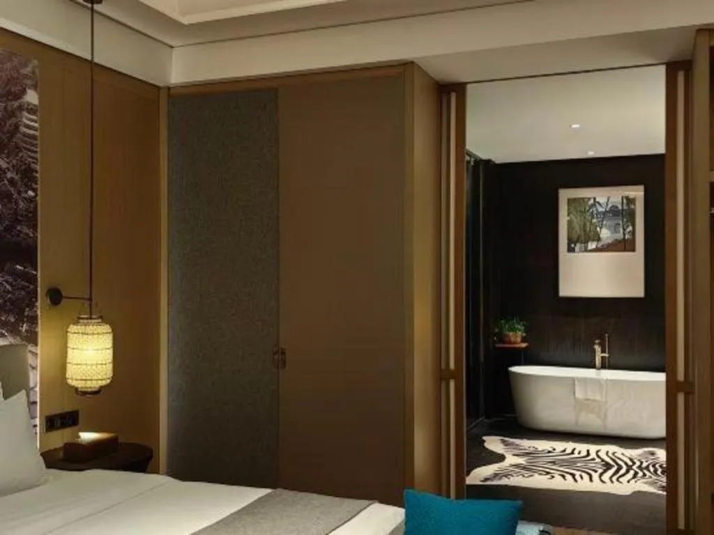 Bed in Jolie Vue Boutique Hotel Sanjiang