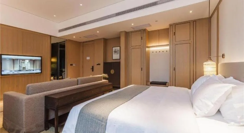 Bed in Jolie Vue Boutique Hotel Sanjiang