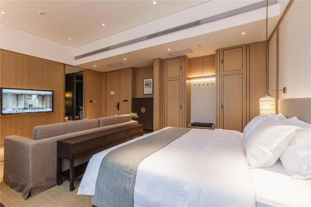 Bed in Jolie Vue Boutique Hotel Sanjiang