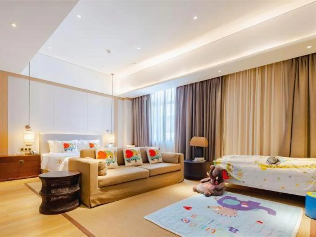 Bed in Jolie Vue Boutique Hotel Sanjiang