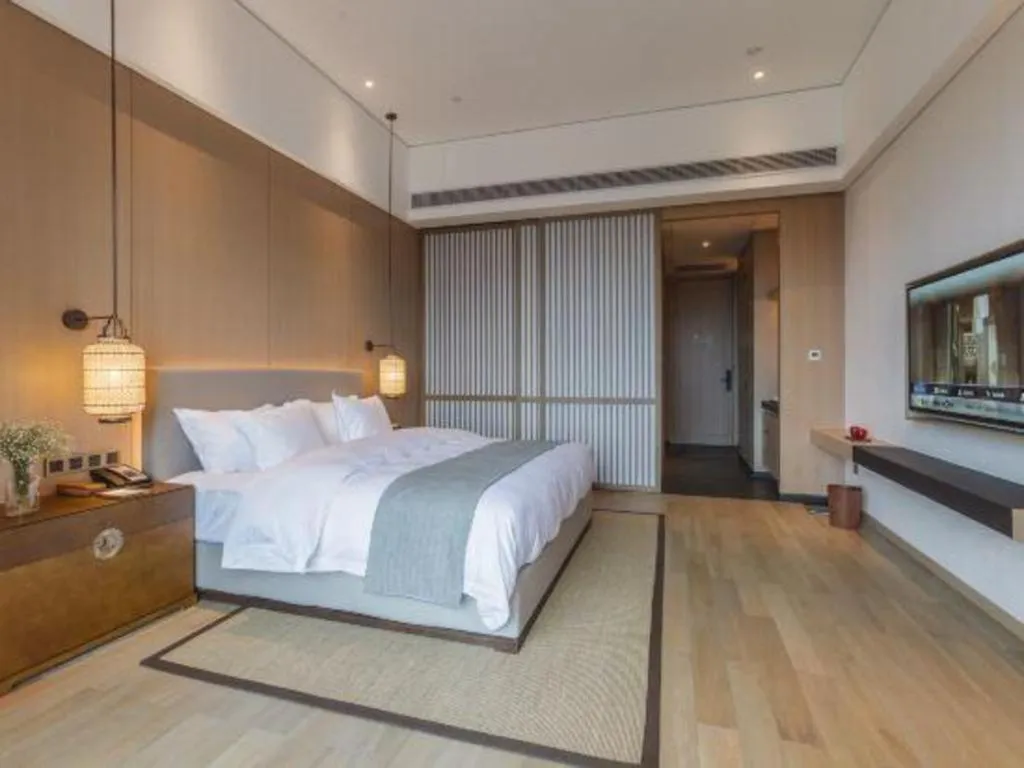 Bed in Jolie Vue Boutique Hotel Sanjiang