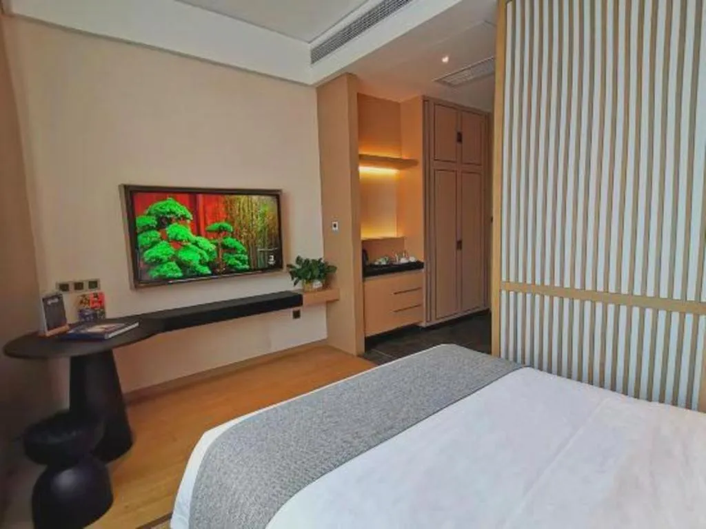 Bed in Jolie Vue Boutique Hotel Sanjiang