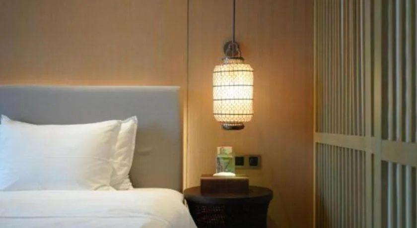 Bed in Jolie Vue Boutique Hotel Sanjiang