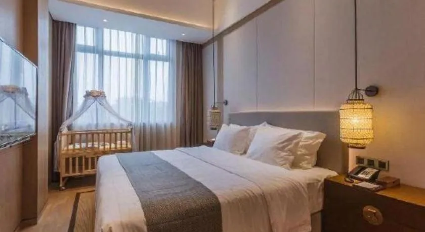 Bed in Jolie Vue Boutique Hotel Sanjiang